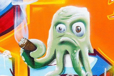 illustration of green octopus holding cigar thumbnail