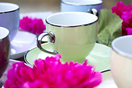 selective focus photography of white teacup and saucer thumbnail