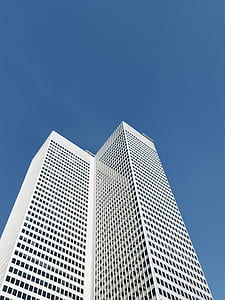 worm's eye-view photo of white high-rise building thumbnail