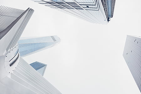 low angle photography of high rise buildings at daytime thumbnail