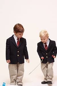 two boys in black lapel suit jackets thumbnail