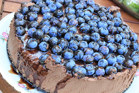 close-up photo of chocolate cake with berries thumbnail