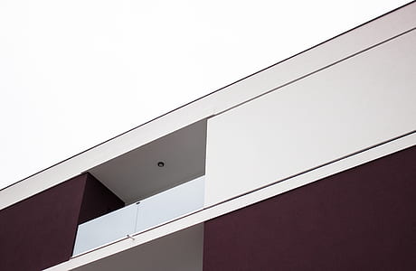low angle photo of white and brown building thumbnail