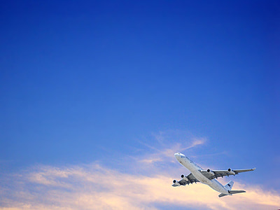 aerial view of airplane in sky thumbnail