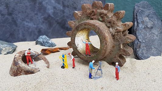 several character figurines on sand thumbnail