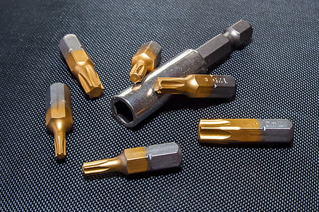 silver and brass metal handheld tool thumbnail