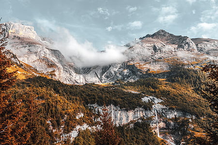 brown mountain covered with snow thumbnail