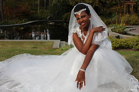 woman wearing white lace wedding gown thumbnail