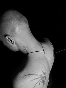 person showing tatto thumbnail