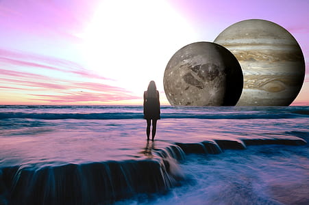 woman standing on waterfalls artwork thumbnail
