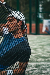 man sitting on net thumbnail