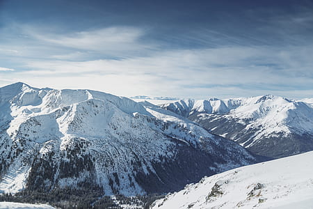 snow covered mountain under clear sky thumbnail