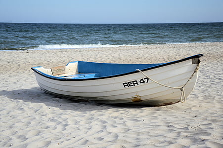 docked boat on shore thumbnail
