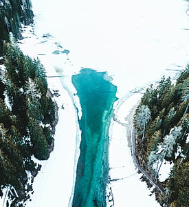 aerial photography of body of water during snow thumbnail