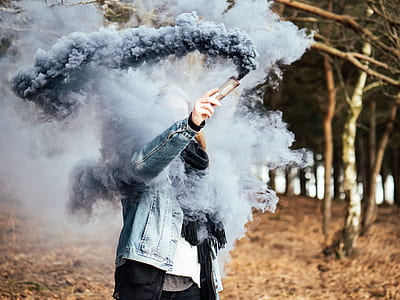 woman holding flare rod thumbnail