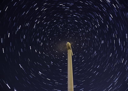 brown post under star trails thumbnail