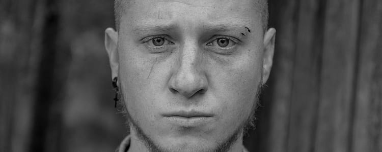 grayscale photo of man's face thumbnail