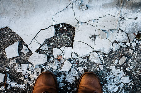 person wearing brown boots thumbnail