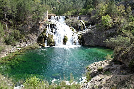 waterfalls between forest thumbnail
