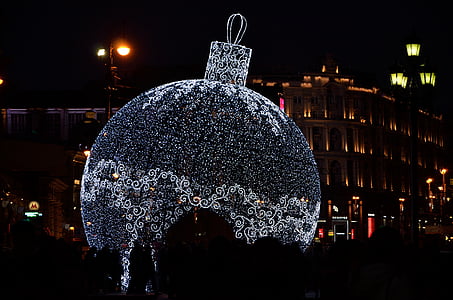gigantic white bauble near building thumbnail