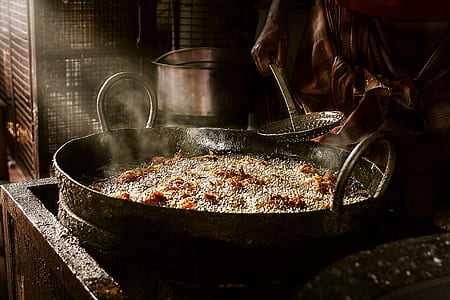 gray steel wok with dish thumbnail