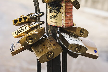 Brass Padlock on Black Metal Stand thumbnail
