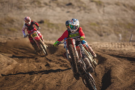 motorcycle riders competing at daytime thumbnail