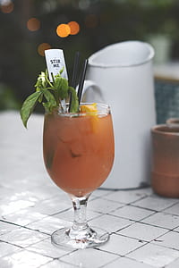 clear footed drinking glass on table thumbnail