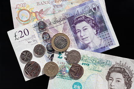 10, 20, and 5 English pounds and coins thumbnail