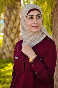 Photo of Woman in Red Abaya thumbnail