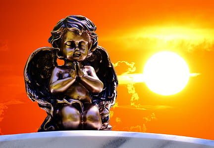 angel statue at sunset thumbnail