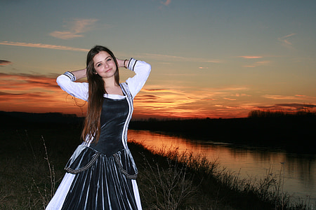 woman wearing white and black dress thumbnail