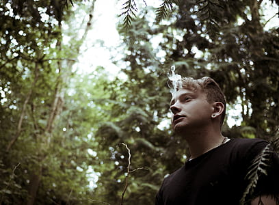 man standing in forest thumbnail