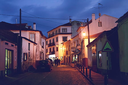 group of people walking on street during night thumbnail