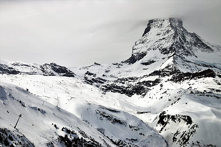 aerial view of snow covered mountain thumbnail