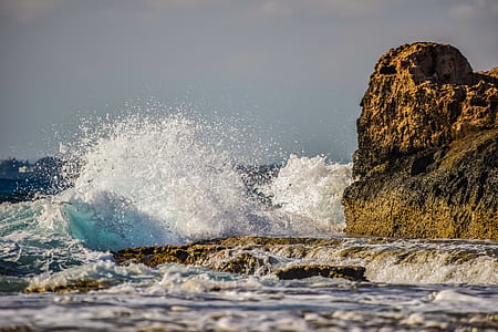 body of water and rock thumbnail