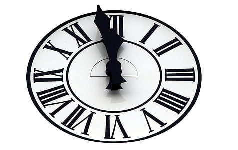 round black analog clock illustration at 11:59 thumbnail