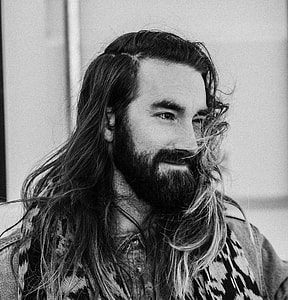grayscale photo of man with beard thumbnail