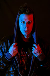 man wearing black leather jacket thumbnail