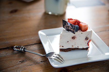 Sliced of Cake on White Ceramic Plate thumbnail