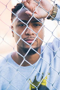 shallow focus photography of man in gray top thumbnail