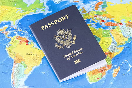 United States of America passport on top of world map thumbnail