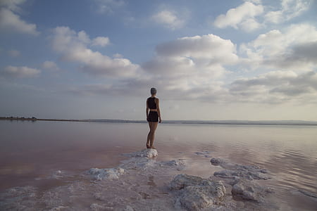 woman standing on iced berg thumbnail
