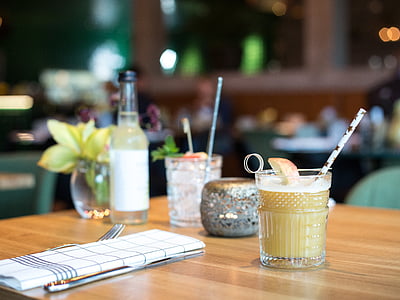 selective focus photography of drink placed near table napkin thumbnail