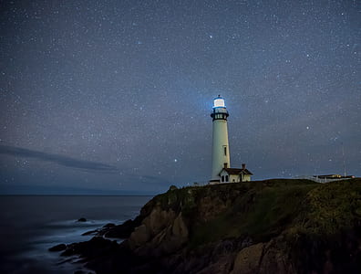 lighthouse near water thumbnail
