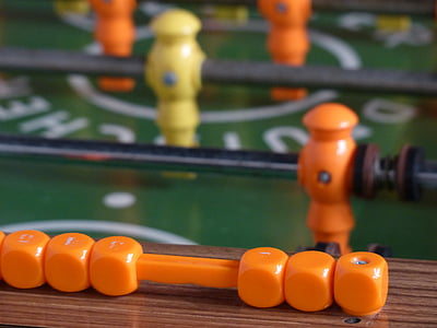 closeup photography of foosball table thumbnail