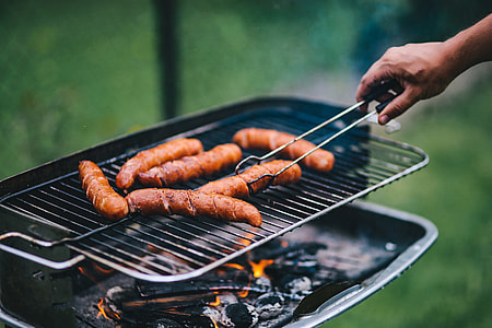 Pork and sausage on the grill thumbnail