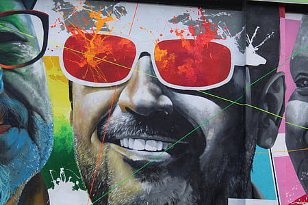 closeup photo of male wearing sunglasses mural thumbnail