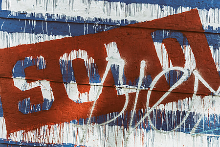 Street art captured on a city wall thumbnail