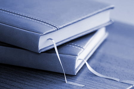 grayscale photo of books thumbnail